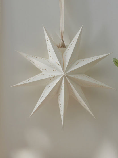Étoile en papier blanc antique détaillée